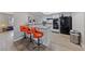 A kitchen with granite countertops, white cabinets and sleek, black appliances at 3630 Mckinley Ave, Las Vegas, NV 89121