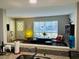 Open living room with stylish furnishings and a view from the kitchen countertop at 3630 Mckinley Ave, Las Vegas, NV 89121