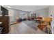 Open living room featuring contemporary decor and wood-look flooring at 3630 Mckinley Ave, Las Vegas, NV 89121