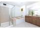 This bright bathroom features a shower, tub, and double vanity at 3732 Via Gennaro, Henderson, NV 89044