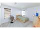 This bedroom features neutral colors and a desk at 3732 Via Gennaro, Henderson, NV 89044