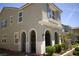 Charming home featuring stucco walls, blue shutters, and a unique arched front porch design at 3732 Via Gennaro, Henderson, NV 89044