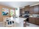 Beautiful kitchen with stainless steel appliances, countertops with breakfast bar, and modern design at 3732 Via Gennaro, Henderson, NV 89044