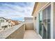 Outdoor balcony with a view of the neighborhood and blue skies at 4364 Contour Bend Ave, North Las Vegas, NV 89084