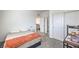 Minimal bedroom with carpet floors, two closets, and a desk workstation at 4364 Contour Bend Ave, North Las Vegas, NV 89084