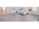 Spacious bedroom with carpet, white furniture, and ample natural light from windows at 4364 Contour Bend Ave, North Las Vegas, NV 89084