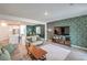 Open-concept living space features a modern kitchen, a dining area, and a comfortable living room at 4364 Contour Bend Ave, North Las Vegas, NV 89084