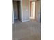 Bedroom with multiple doorways and neutral walls at 4798 Luna Ridge Ct, Las Vegas, NV 89129