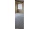 Bedroom with light walls and a window at 4798 Luna Ridge Ct, Las Vegas, NV 89129