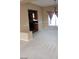 Dining room view into kitchen area with carpeted floors and natural light at 4798 Luna Ridge Ct, Las Vegas, NV 89129