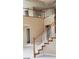 Upstairs foyer with wood and white railing at 4798 Luna Ridge Ct, Las Vegas, NV 89129