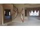 Spacious foyer with a staircase and views into the living room at 4798 Luna Ridge Ct, Las Vegas, NV 89129