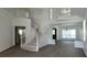 Bright living room featuring hardwood floors, a staircase and plenty of natural light at 4798 Luna Ridge Ct, Las Vegas, NV 89129