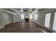 Bright living room with wood floors, fireplace, ceiling fan and lots of light at 4798 Luna Ridge Ct, Las Vegas, NV 89129