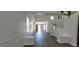 Bright living room featuring hardwood floors, staircase and plenty of natural light at 4798 Luna Ridge Ct, Las Vegas, NV 89129