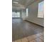 Bright living room with large windows, offering natural light and an airy, open floor plan at 4798 Luna Ridge Ct, Las Vegas, NV 89129