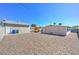 Backyard featuring a playset, artificial turf, and sand for outdoor fun at 524 8Th St, Boulder City, NV 89005