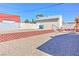 Backyard featuring a playset, artificial turf, and sand for outdoor fun at 524 8Th St, Boulder City, NV 89005