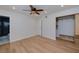 Bright bedroom with hardwood floors, recessed lighting, and a modern closet system at 524 8Th St, Boulder City, NV 89005