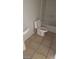 Standard bathroom with tile flooring, toilet and white bathtub at 5413 Bristol Bend Ct, Las Vegas, NV 89135