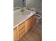 Clean bathroom with a single sink vanity and light cabinets at 5413 Bristol Bend Ct, Las Vegas, NV 89135