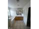 Bright bathroom featuring a double sink vanity, soaking tub, and tiled floors at 5413 Bristol Bend Ct, Las Vegas, NV 89135