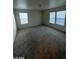 Bedroom featuring neutral carpet, two windows providing natural light, and neutral walls with outlets at 5413 Bristol Bend Ct, Las Vegas, NV 89135