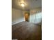 Bedroom with a closet featuring white doors and neutral carpeting at 5413 Bristol Bend Ct, Las Vegas, NV 89135