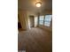 Bedroom with natural light with windows and a closet with sliding doors at 5413 Bristol Bend Ct, Las Vegas, NV 89135