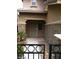 Inviting front entrance with a security screen door, stone accents, and decorative landscaping at 5413 Bristol Bend Ct, Las Vegas, NV 89135