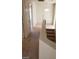 Neutral hallway featuring a white front door, stairs and a second doorway at 5413 Bristol Bend Ct, Las Vegas, NV 89135