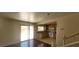 Bright kitchen with stainless steel appliances, tile floor and sliding glass door at 5413 Bristol Bend Ct, Las Vegas, NV 89135