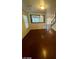 Inviting living room featuring wood floors, and staircase at 5413 Bristol Bend Ct, Las Vegas, NV 89135