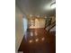 Open-concept living room with hardwood floors flows seamlessly into the kitchen at 5413 Bristol Bend Ct, Las Vegas, NV 89135