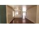 An open-concept living space featuring wood floors and natural light at 5413 Bristol Bend Ct, Las Vegas, NV 89135