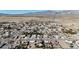 Wide aerial view of the community showing the landscape, mountain views, and neighborhood layout at 5841 Doubletree Rd, Pahrump, NV 89061