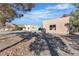 Large backyard showing detached structure and landscaping, offering privacy and space for various outdoor activities at 5841 Doubletree Rd, Pahrump, NV 89061
