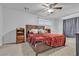 Cozy bedroom with carpet floors, a ceiling fan and a dresser at 5841 Doubletree Rd, Pahrump, NV 89061