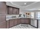 Well-equipped kitchen boasts stainless steel appliances, granite countertops, and ample cabinet space for storage and functionality at 5841 Doubletree Rd, Pahrump, NV 89061