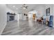 Bright and spacious living area features a fireplace, seamlessly connecting to the kitchen and dining spaces, for gatherings at 5841 Doubletree Rd, Pahrump, NV 89061
