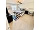 Bedroom with neutral carpet, shuttered windows, and blue striped decor at 6145 Scarlet Leaf St, Las Vegas, NV 89148