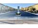 Elegant community entrance featuring a stylish sign and well-manicured landscaping, creating a welcoming first impression at 6145 Scarlet Leaf St, Las Vegas, NV 89148