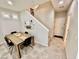 Cozy dining area with modern table, chairs, and tiled floor at 6145 Scarlet Leaf St, Las Vegas, NV 89148