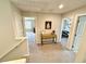 Second story hall with art, table and access to multiple bedrooms and bathroom at 6145 Scarlet Leaf St, Las Vegas, NV 89148