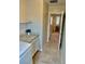 Efficient laundry area with tile flooring, washer, and dryer, offers convenience and functionality at 6145 Scarlet Leaf St, Las Vegas, NV 89148