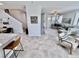 Open-concept living area with modern furnishings, neutral tones, and plenty of natural light at 6145 Scarlet Leaf St, Las Vegas, NV 89148