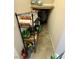 Walk-in pantry with ample shelving for storage and tile floors at 6145 Scarlet Leaf St, Las Vegas, NV 89148