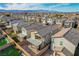 Inviting residence with an outdoor lounge and yard space nestled in a vibrant community with mountain views at 6221 Desert Orchid Way, Las Vegas, NV 89141