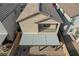 A close aerial of this home, showing a patio cover and small second story balcony at 6221 Desert Orchid Way, Las Vegas, NV 89141