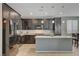 Well-lit kitchen showcasing granite counters, sleek appliances, and easy access to the dining space at 6221 Desert Orchid Way, Las Vegas, NV 89141